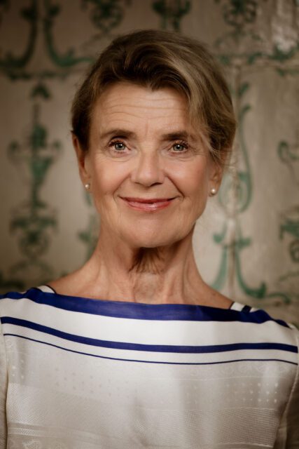 Actress Stina Ekblad, woman with blond and grey hair, looks directly at the camera.
