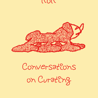 soft yellow background, red drawing of a ambiguous creature. the letters KOK written in red above.