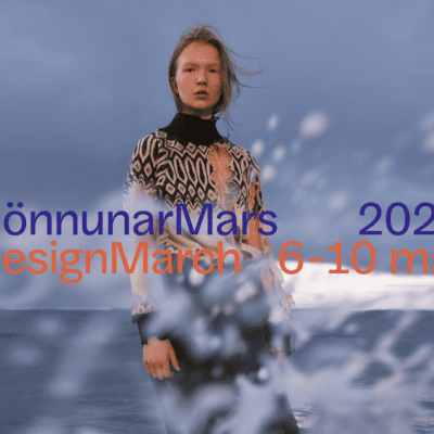 picture of designer in her own collection with the text: Design March and Hinnun Mars in blue and organe with a wave splashing water infront of the designer