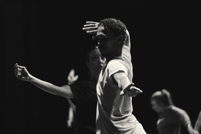 Black and White image of people dancing.